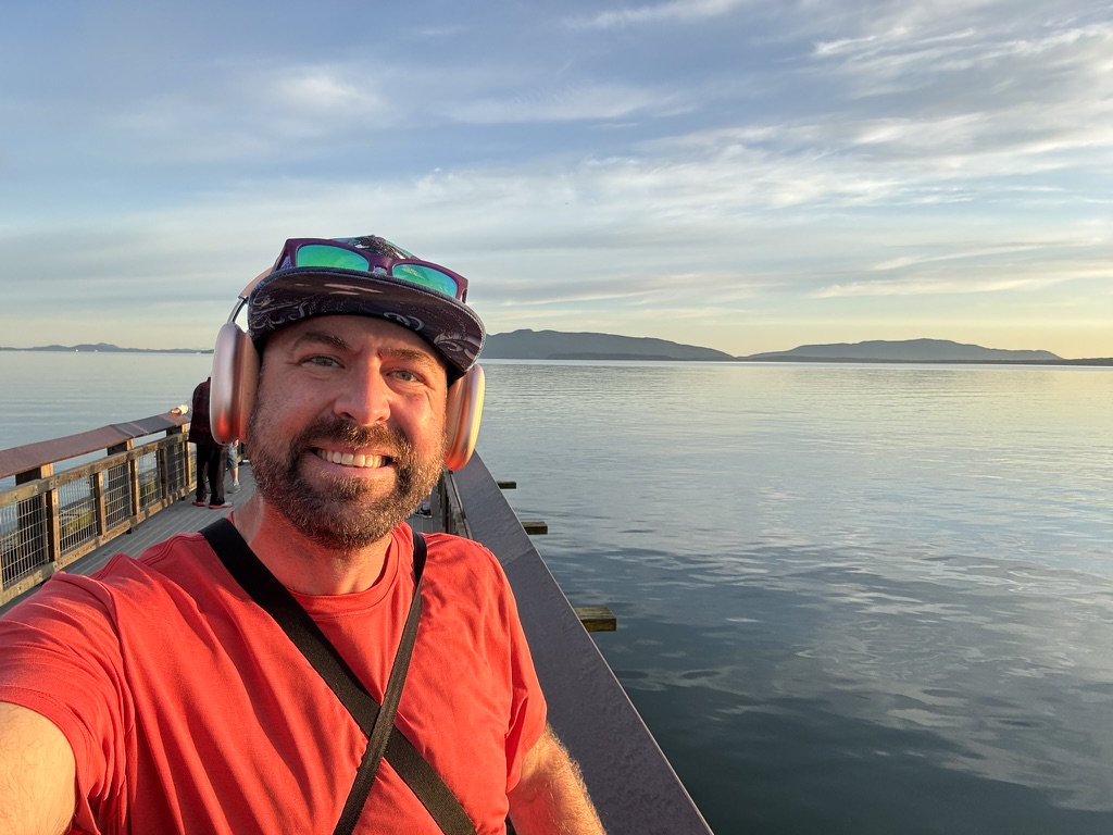 I_Am_Getting_Married_v1.zip 5 Selfie of Tukayote in headphones on Little Squalicum Pier at golden hour