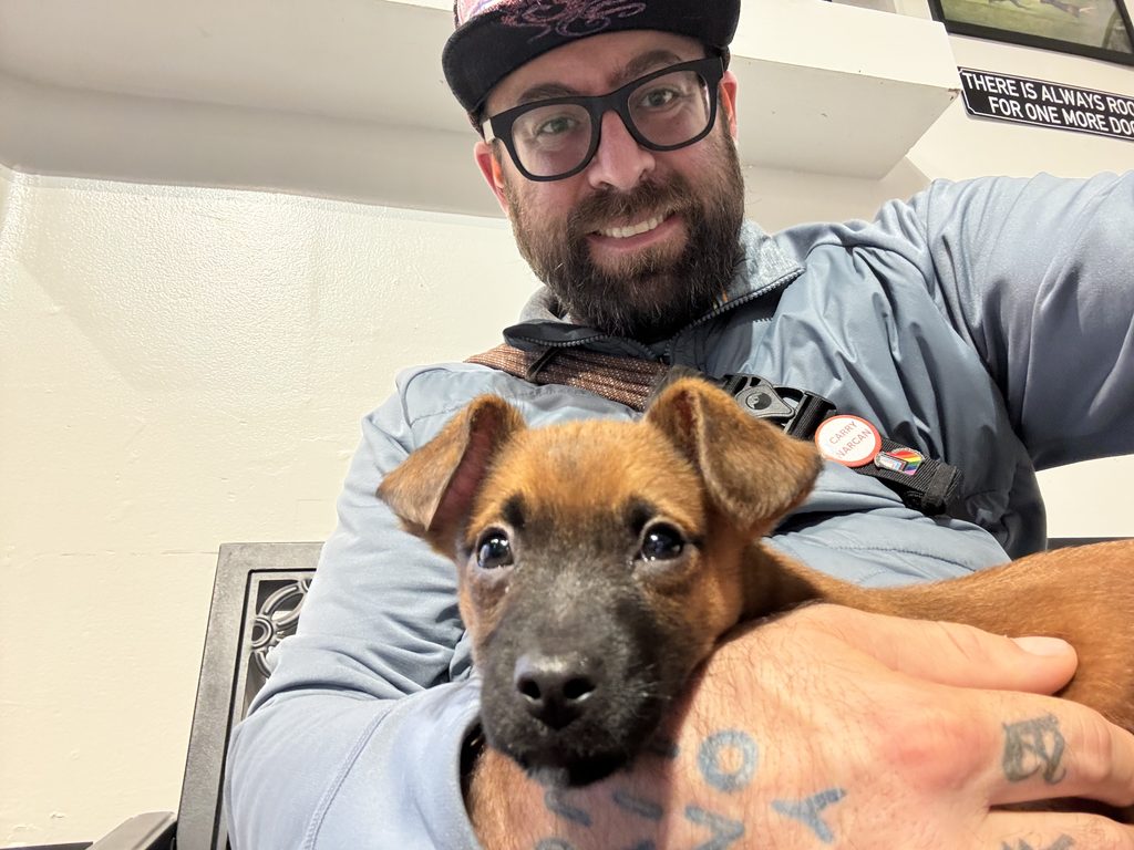 I_Am_Getting_Married_v1.zip 9 Selfie of Tukayote holding a brown puppy