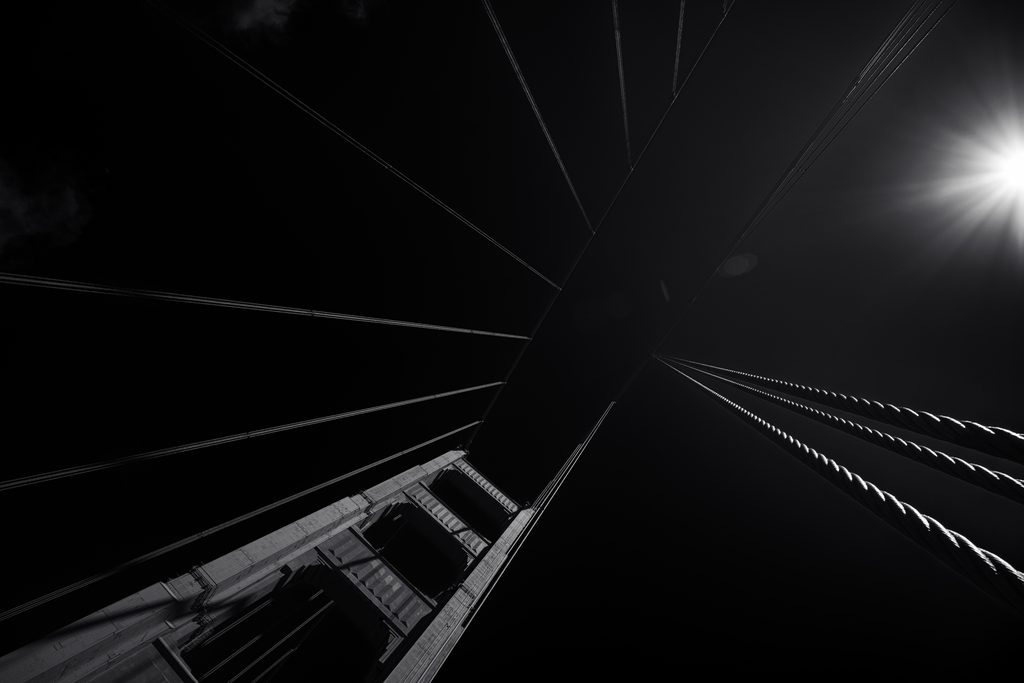 Severed_v1.zip 15 Black and white view looking up at bridge cables toward a bright light