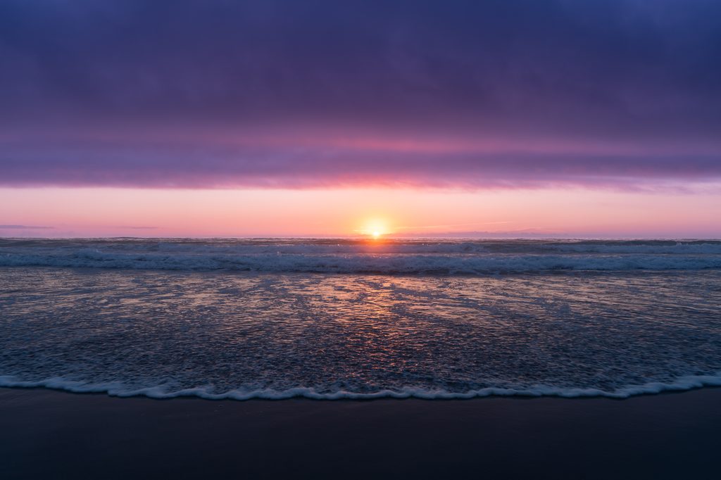 Severed_v1.zip 4 Sunset over the ocean with waves rolling onto the beach