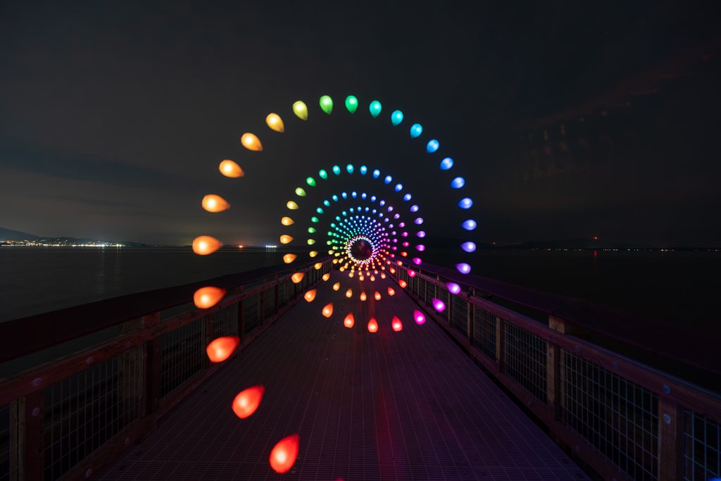 Severed_v1.zip 3 Spiral of colorful light orbs over Little Squalicum Pier at night