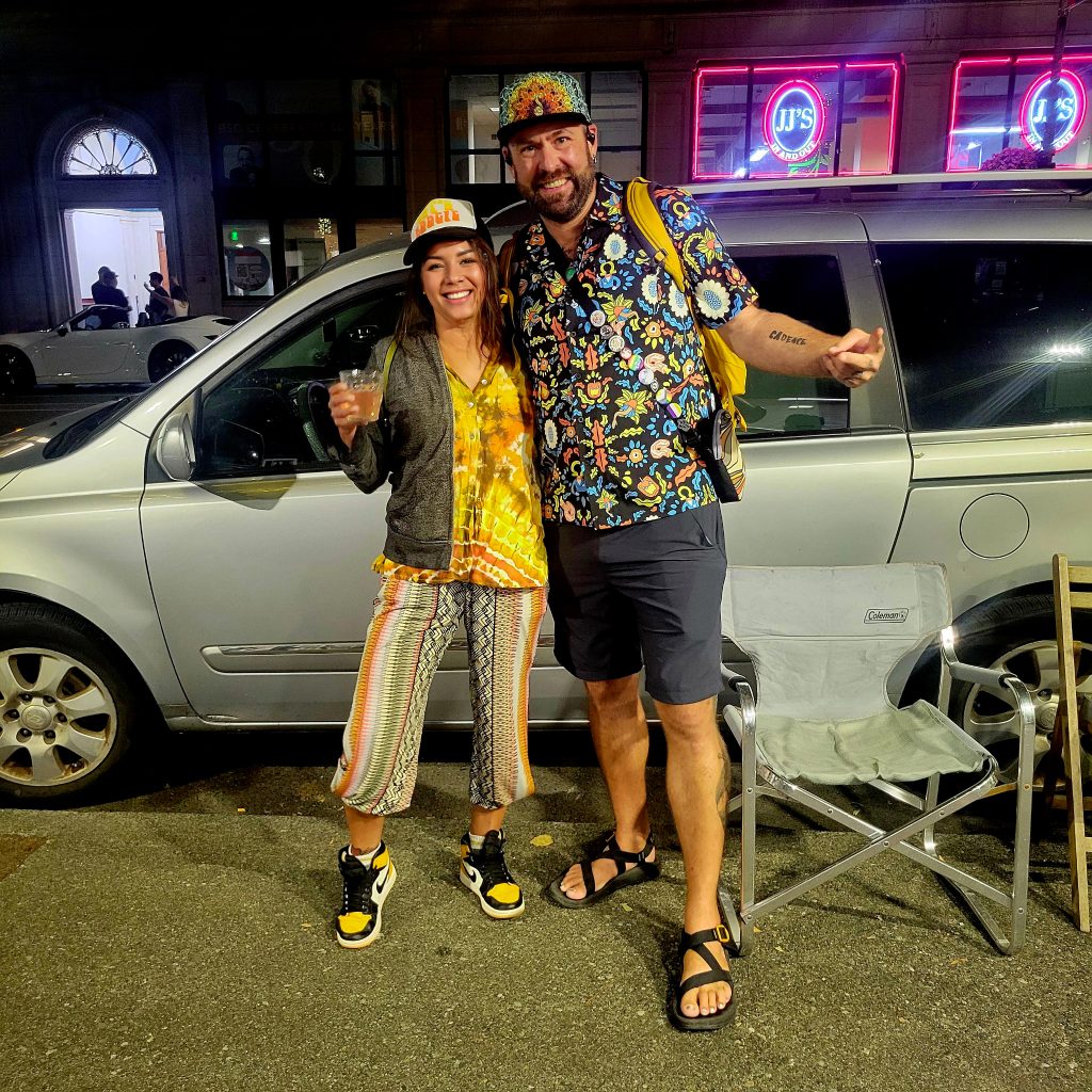 I_Am_Getting_Married_v1.zip 3 Tukayote and a friend in colorful outfits posing on the street at night